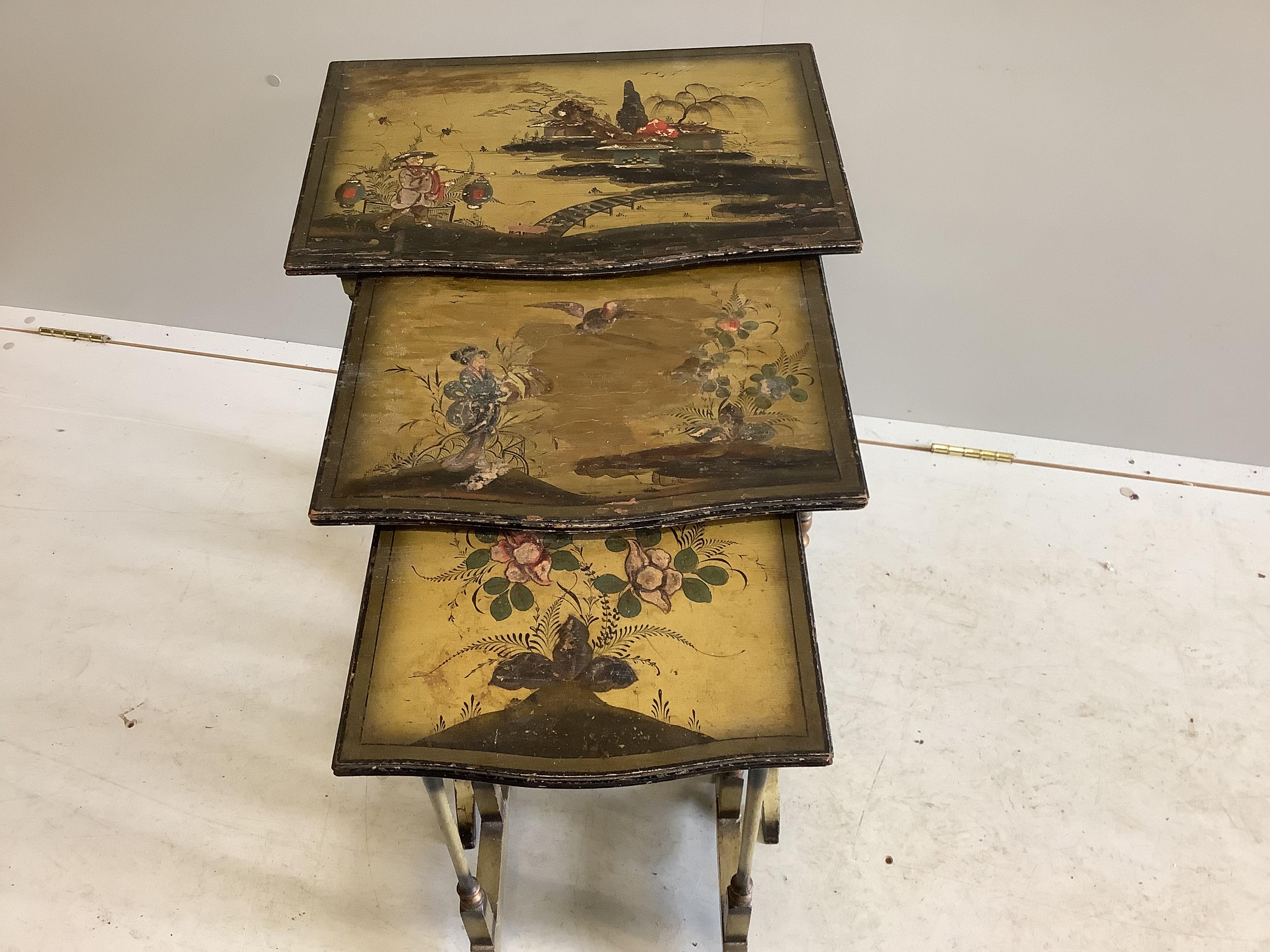 A nest of three chinoiserie lacquer tea tables, width 48cm, depth 33cm, height 60cm
